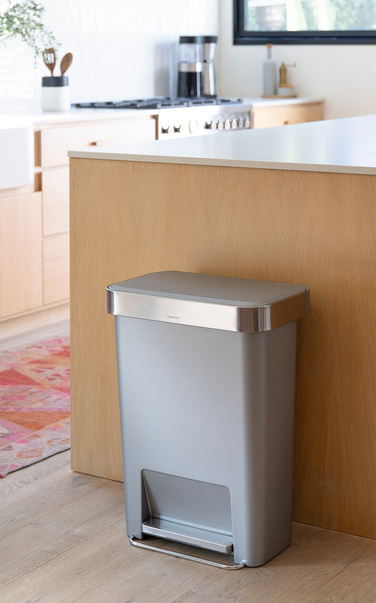 Simplehuman's Alloy Hybrid Can in a modern kitchen setting. 