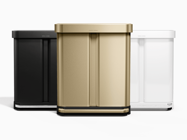 Simplehuman's Step Recyclers with Matte Gold in the center, Matte Black to the left, and White to the right. 