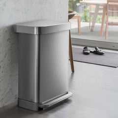 45L rectangular pedal bin with liner pocket - brushed finish - lifestyle up against wall