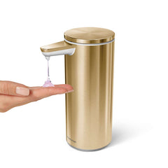 rechargeable liquid soap sensor pump- brass finish - hand under soap pump image